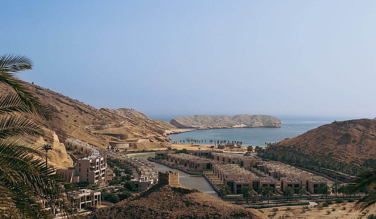 Aerial view of the Muscat Bay community and the bay