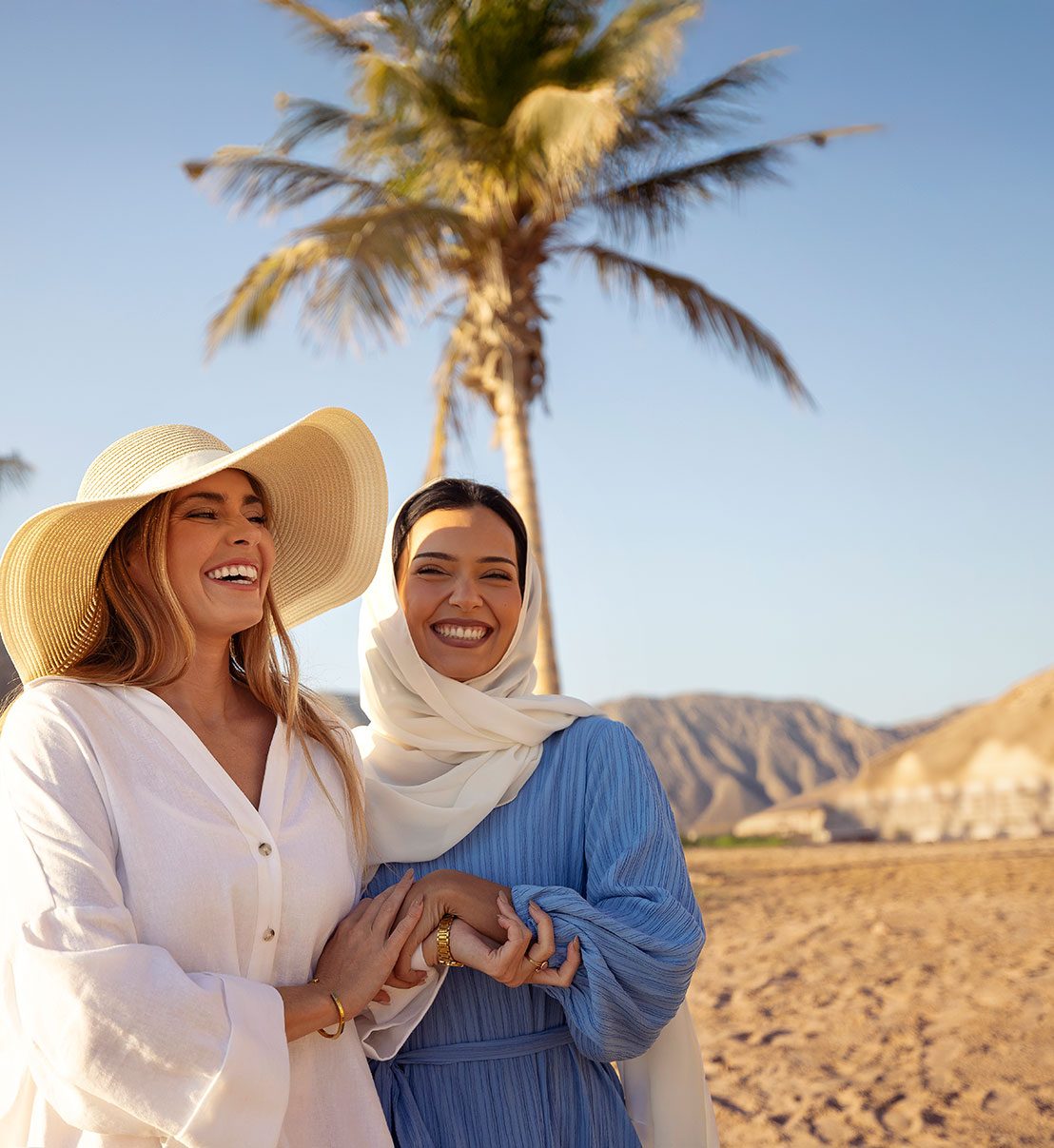 Friends on the beach near Muscat Bay