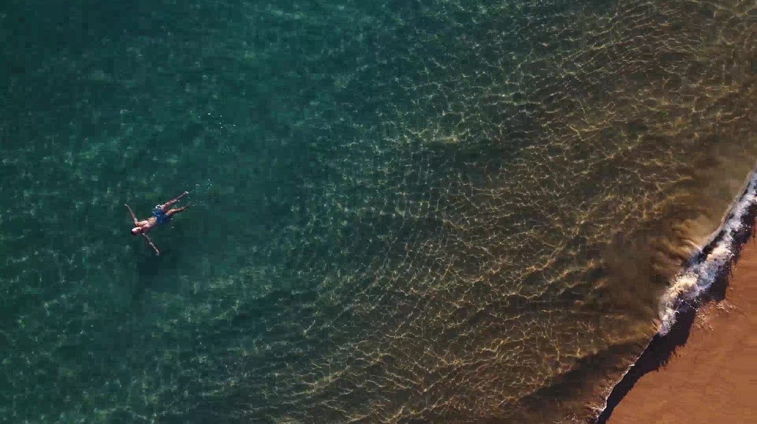 Turquoise water of the bay seen from above